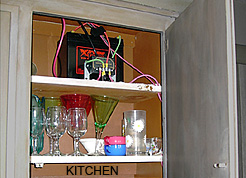 The battery that powers the kitchen lights is charged by solar energy during the day