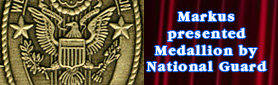Markus presented medal by National Guard