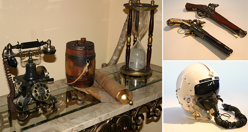 period props, flight helmet, buccaneer pistols, hourglass, pirate props, turn of the century Eiffel Tower telephone
